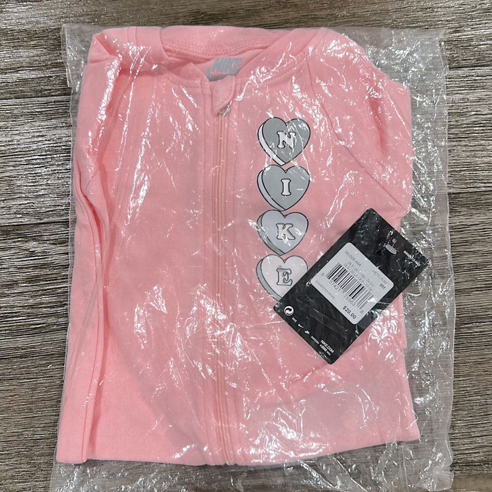 Brand New Nike girl one-piece Sz. 9 months